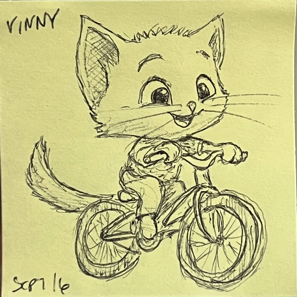 Kitten on a Bike
